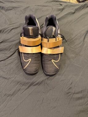 Nike Romelos black and gold men's 11